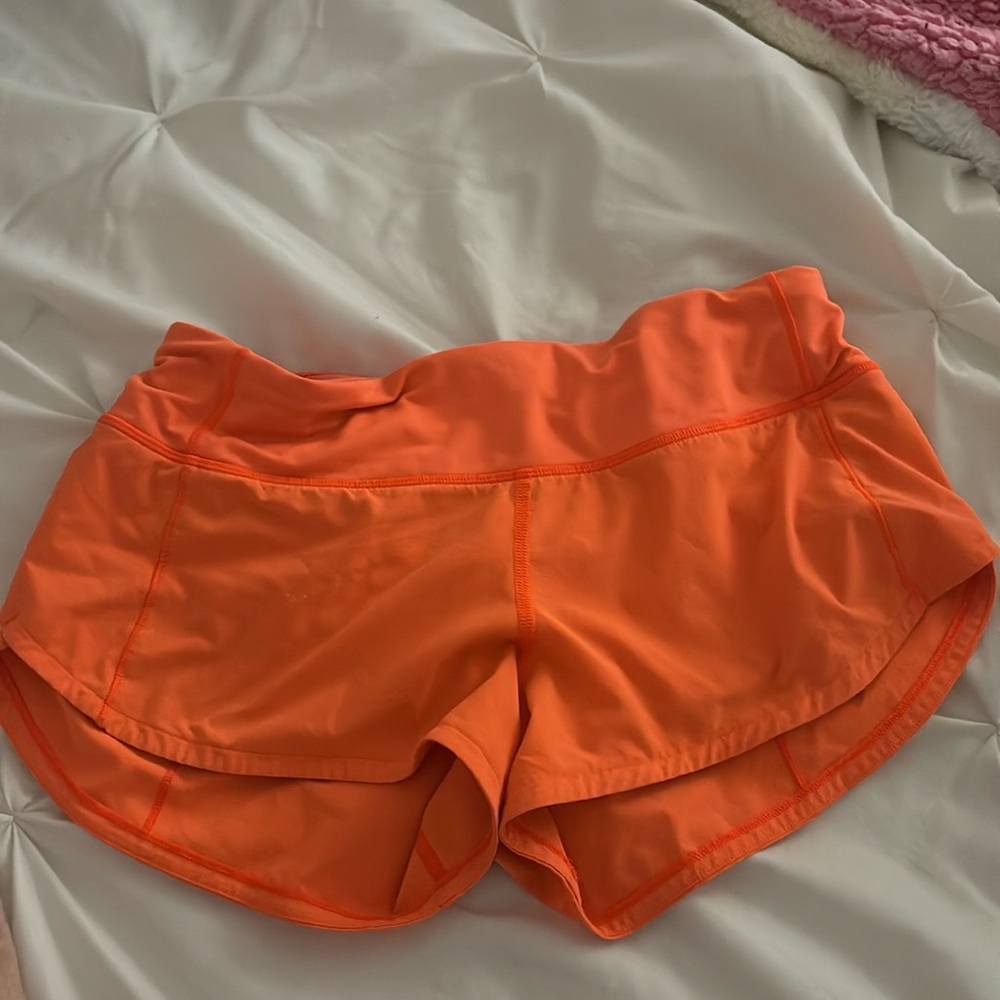 Great condition lululemon orange speed ups size 4!🧡